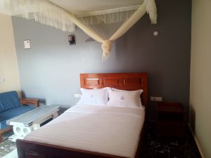 Comfortable guest bedroom at Akengyeya Country Hotel